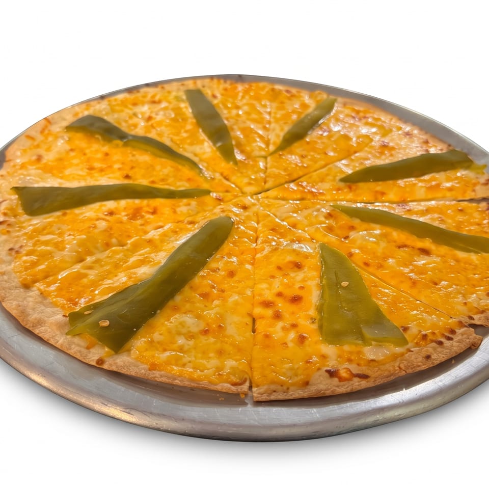 Cheese pizza topped with green pepper strips, sliced into wedges and served on a round metal platter.