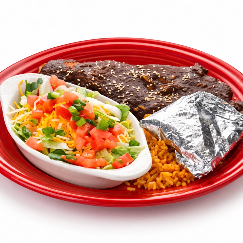 Red plate with seasoned beef, foil-wrapped burrito, Mexican rice, and a colorful salad topped with cheese and tomatoes.